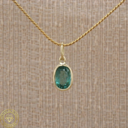 Pingente de turmalina . Ouro amarelo 18k.